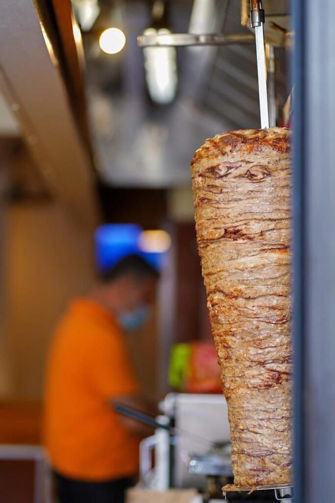 A Brick Is Holding Up This 1100° Shawarma Fire